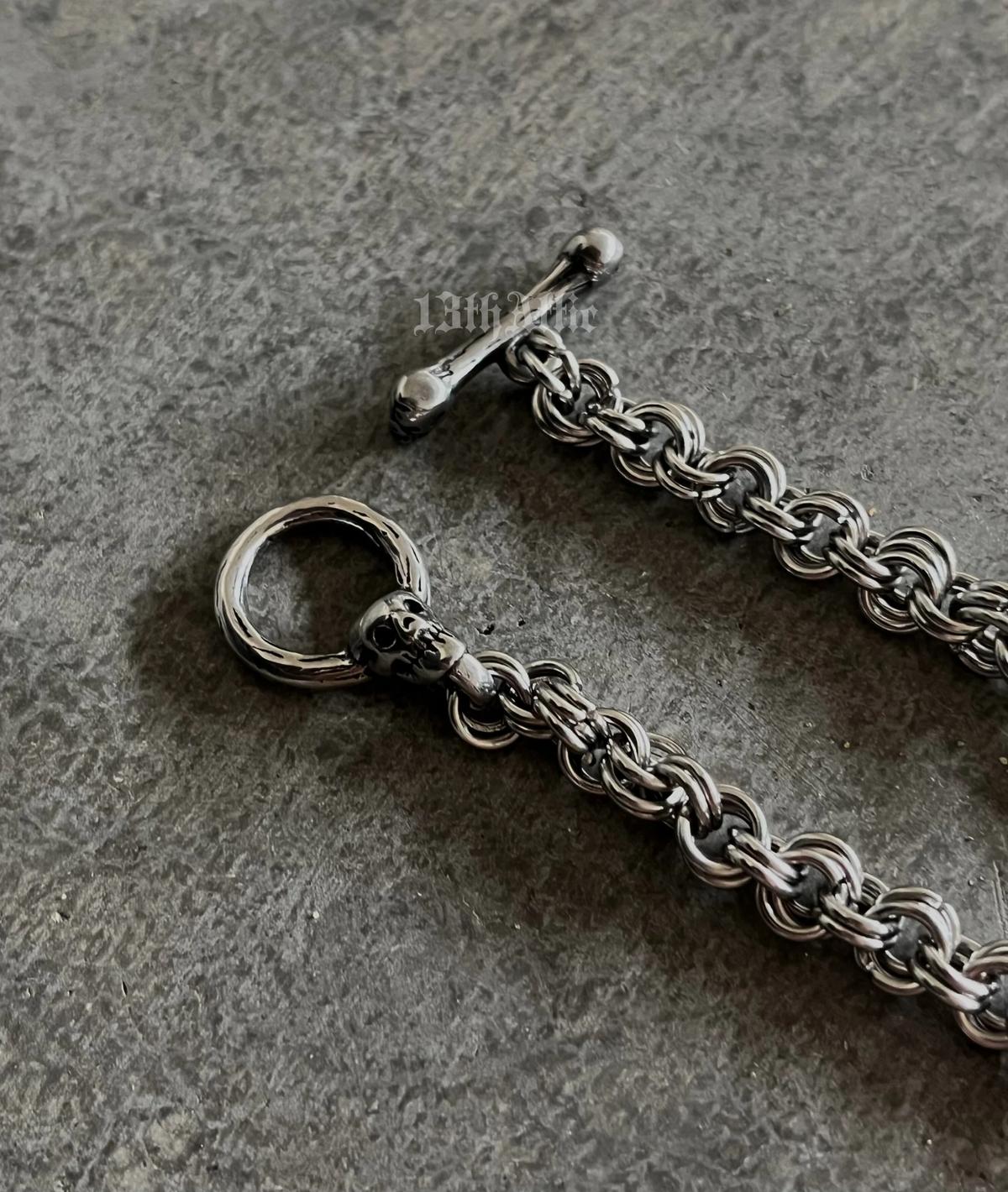Handmade stainless steel chainmaille bracelet with a skull clasp, featuring an intricate weave and polished finish. A bold, edgy accessory perfect for gothic, biker, and alternative fashion.